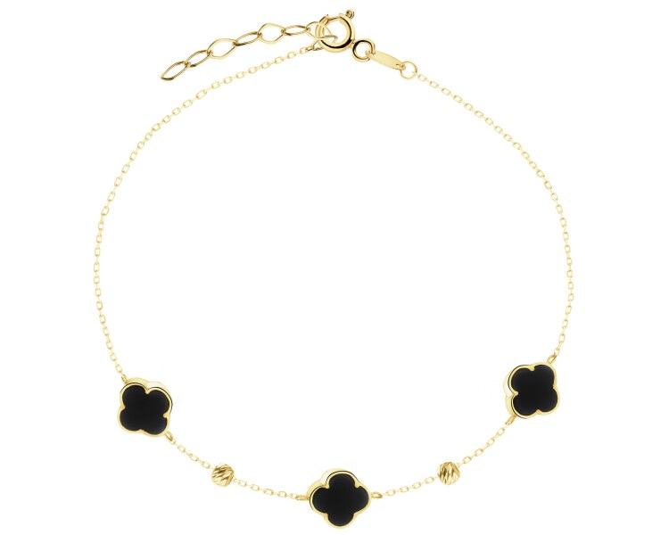 Złota bransoletka z onyksami syntetycznymi - koniczyny