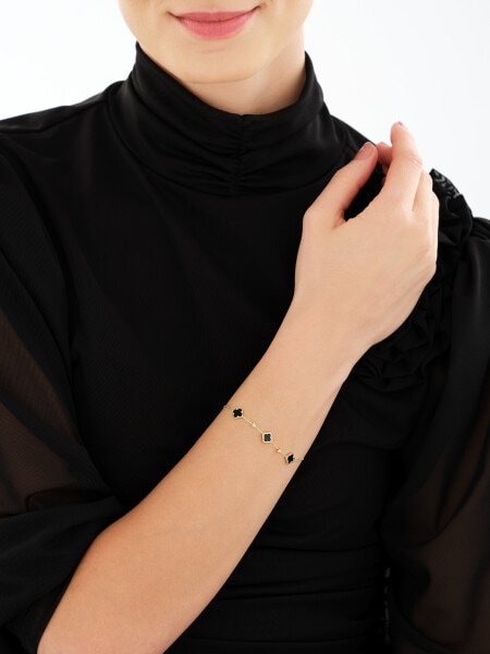Złota bransoletka z onyksami syntetycznymi - koniczyny