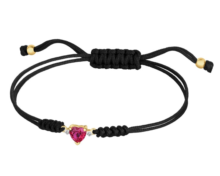 Bransoletka z elementami żółtego złota i diamentami i rubinem syntetycznym - serce - próba 375