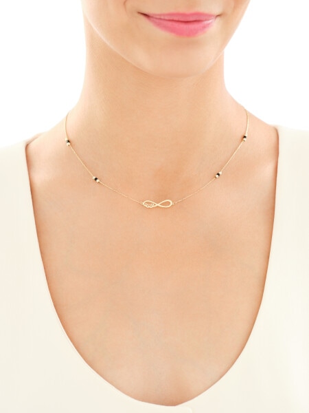 Złoty naszyjnik z cyrkoniami - nieskończoność, serca, kulki