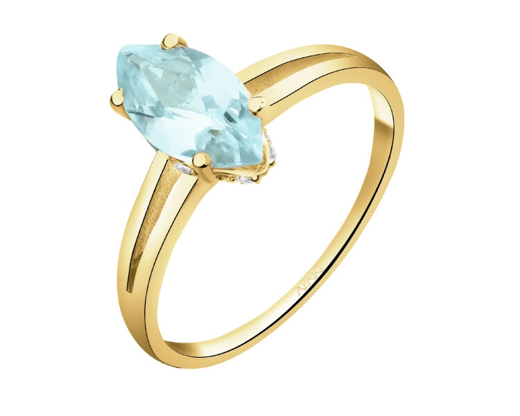 Złoty pierścionek z topazem i cyrkoniami