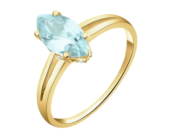 Złoty pierścionek z topazem i cyrkoniami