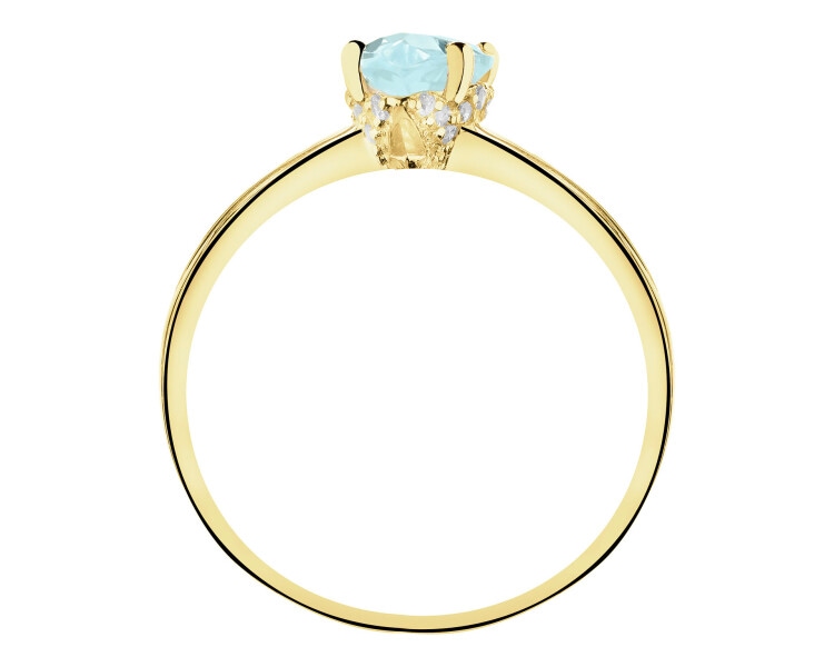 Złoty pierścionek z topazem i cyrkoniami