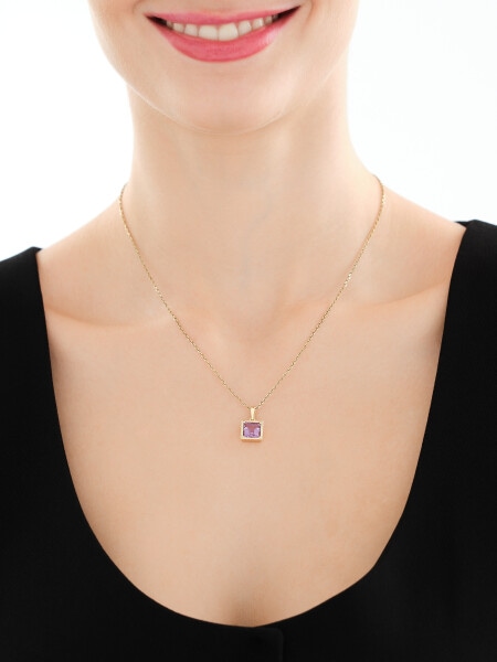 Złota zawieszka z ametystem