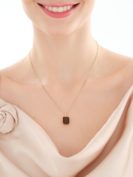 Złota zawieszka z kwarcem