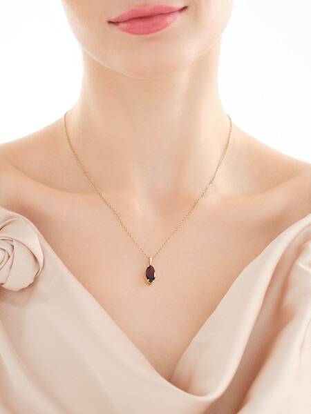 Złota zawieszka z granatem