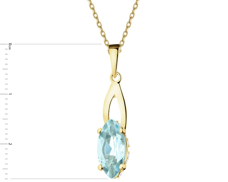 Złota zawieszka z topazem i cyrkoniami