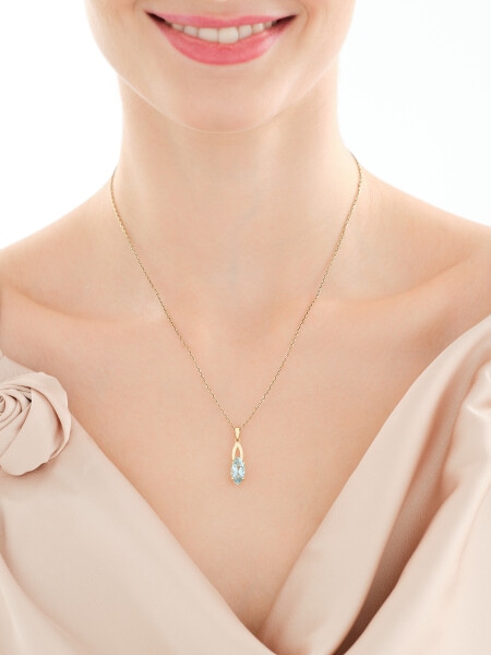 Złota zawieszka z topazem i cyrkoniami