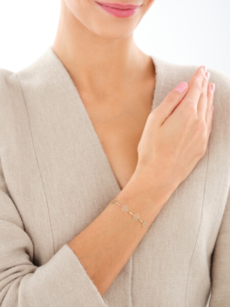 Złota bransoletka z cyrkonią - tarcze słoneczne