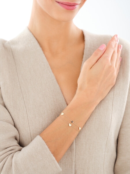 Złota bransoletka z cyrkoniami - serca