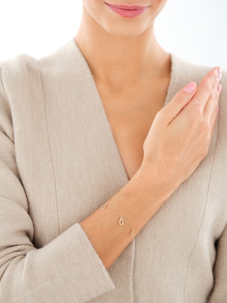 Złota bransoletka z cyrkonią - podkowy