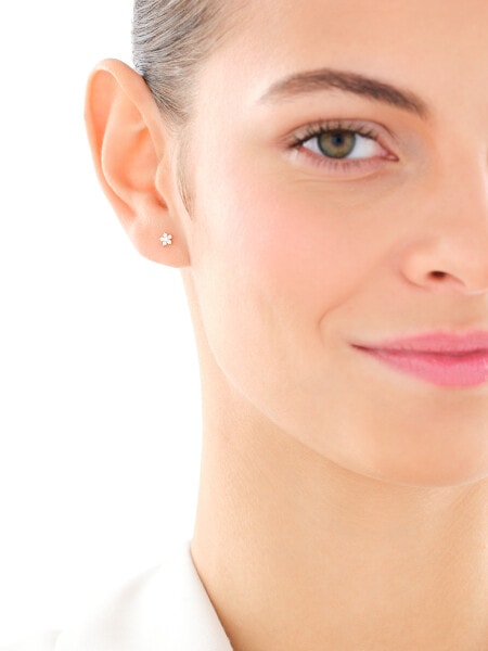 Pojedynczy złoty kolczyk z cyrkoniami do piercingu - kwiat