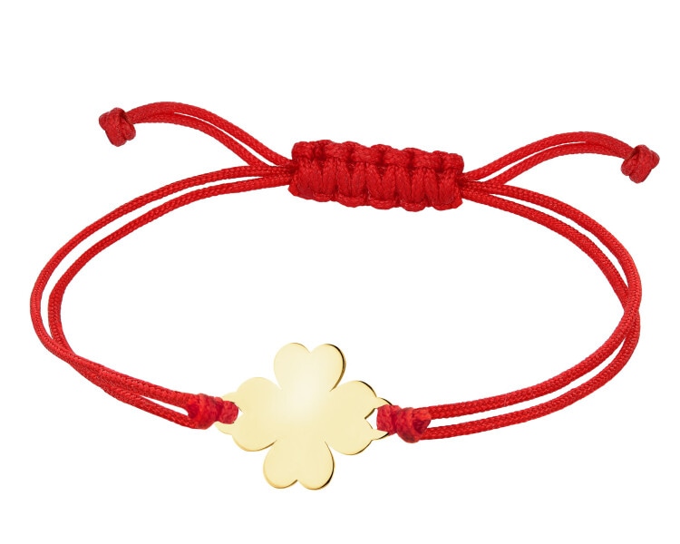 Bransoletka z elementem z żółtego złota - koniczyna