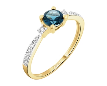 Pierścionek z żółtego złota z diamentami i Topazem London Blue - próba 585