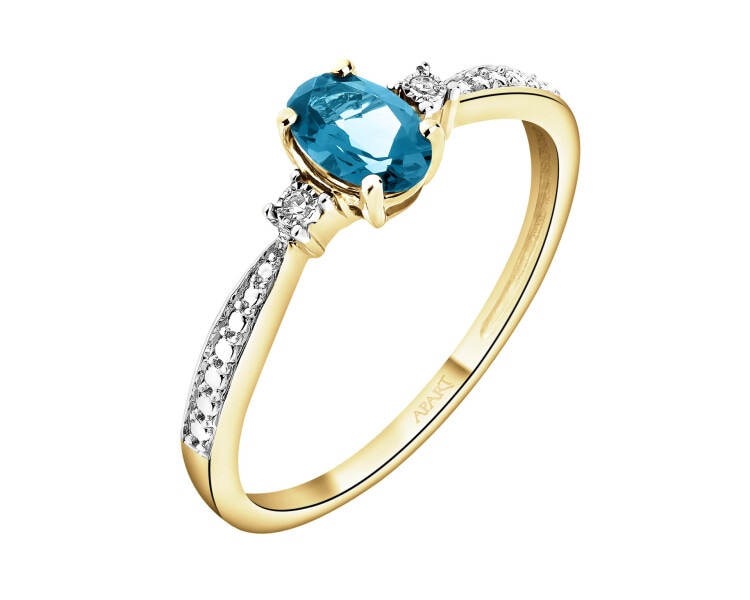 Pierścionek z żółtego złota z diamentami i Topazem London Blue - próba 375