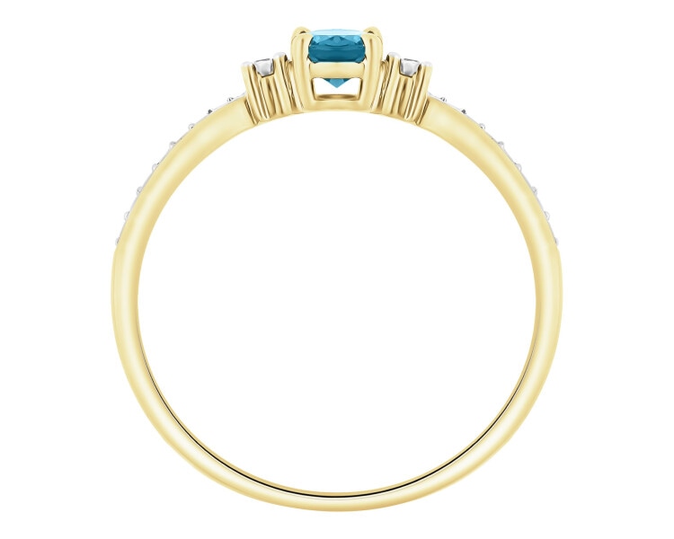 Pierścionek z żółtego złota z diamentami i Topazem London Blue - próba 375