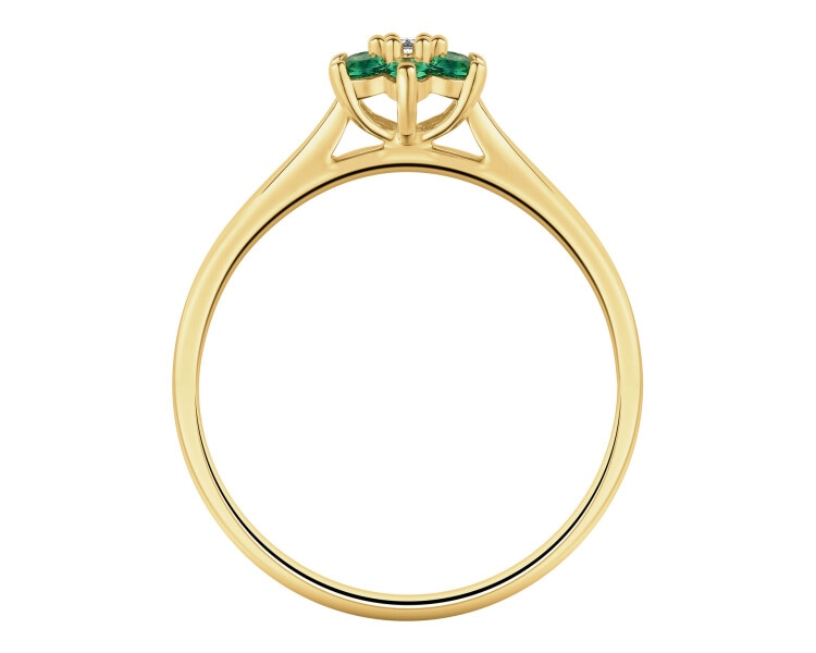 Pierścionek z żółtego złota z brylantem i szmaragdami syntetycznymi - kwiat - próba 375