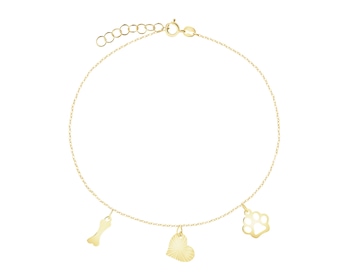 Złota bransoletka - łapka, serce, kość