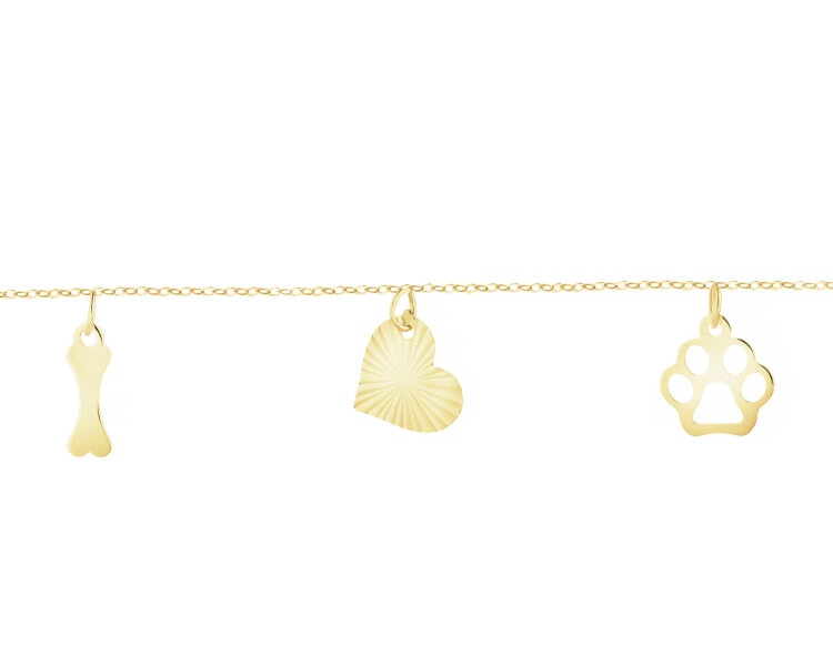 Złota bransoletka - łapka, serce, kość