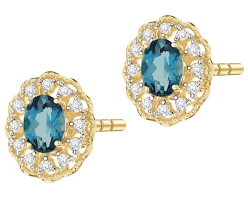 Kolczyki z żółtego złota z diamentami i topazami London Blue - próba 585