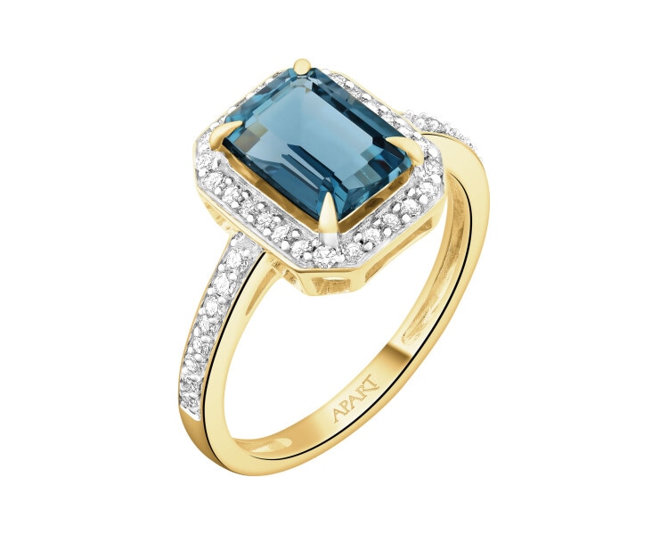 Pierścionek z żółtego złota z diamentami i topazem London Blue - próba 585