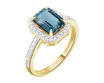 Pierścionek z żółtego złota z diamentami i topazem London Blue - próba 585