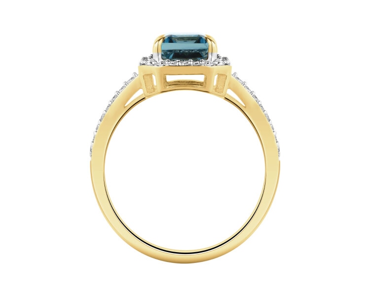 Pierścionek z żółtego złota z diamentami i topazem London Blue - próba 585
