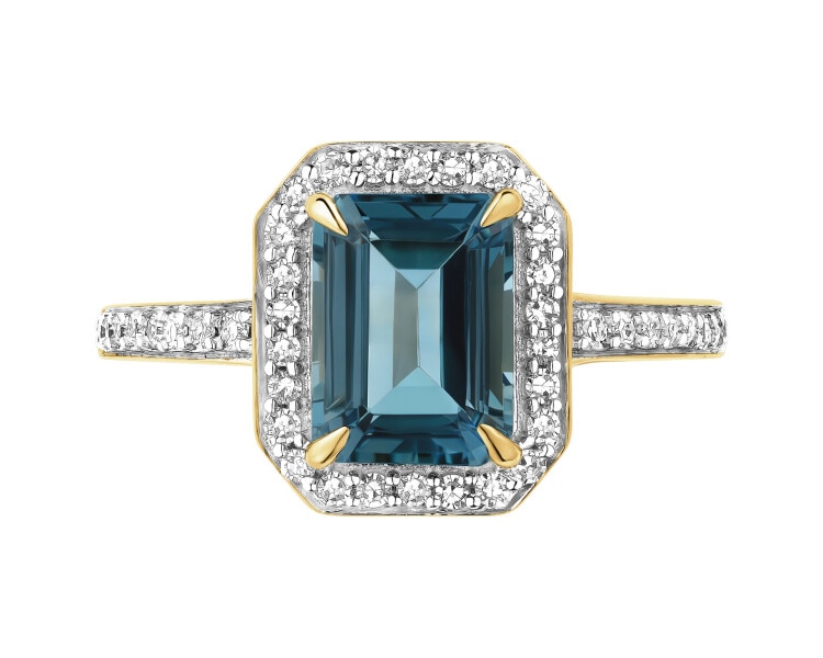 Pierścionek z żółtego złota z diamentami i topazem London Blue - próba 585