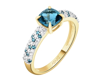 Pierścionek z żółtego złota z diamentami i topazami London Blue - próba 585