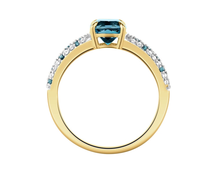 Pierścionek z żółtego złota z diamentami i topazami London Blue - próba 585
