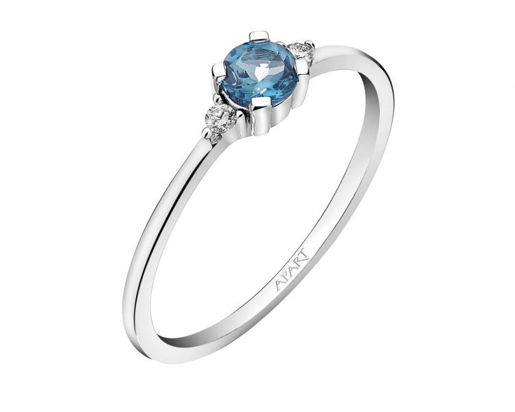 Prsten z bílého zlata s brilianty a topazem London Blue - ryzost 585